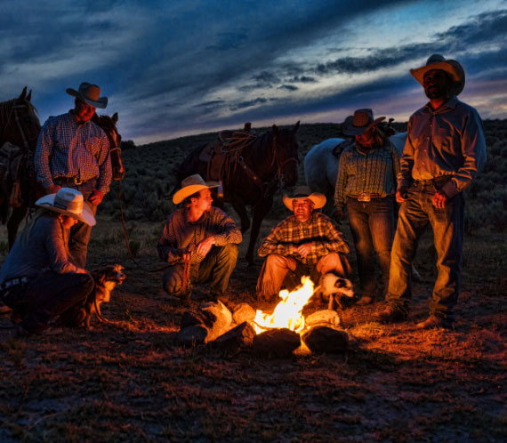 cowboys around fire